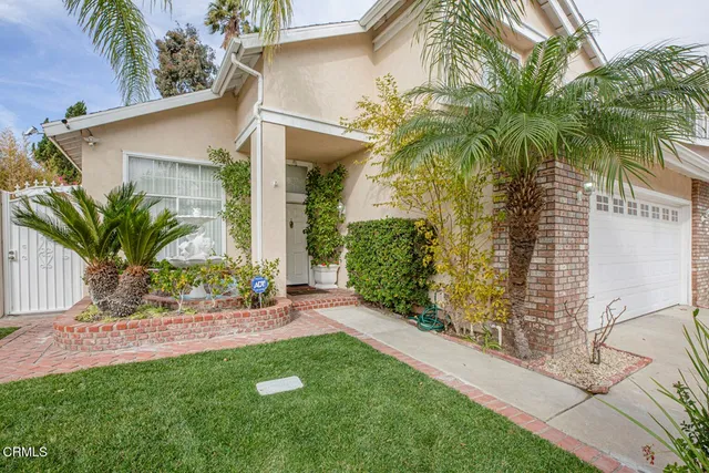 a view of a yard with a patio
