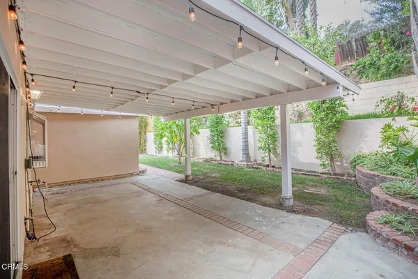 a view of backyard with green space