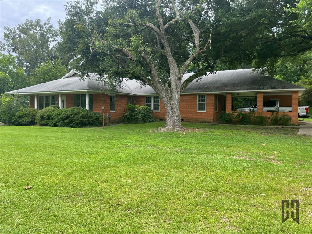714 Butler Street Springhill, LA 71075 - Photo 2 of 22 2 car carport