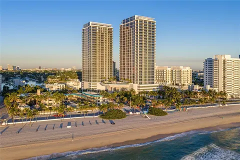 a view of a city with tall buildings