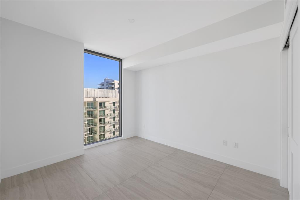 151 North Seabreeze Boulevard, Unit 903E Fort Lauderdale, FL 33304 - Photo 21 of 49 wooden floor in an empty room