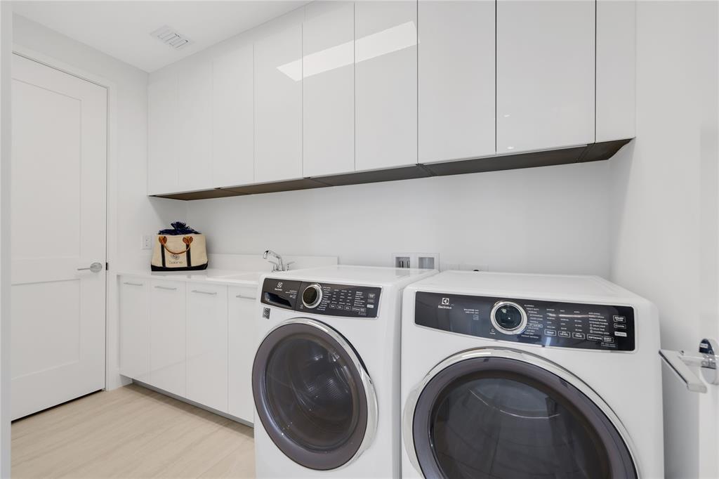 151 North Seabreeze Boulevard, Unit 903E Fort Lauderdale, FL 33304 - Photo 27 of 49 a view of storage and utility room with washer and dryer