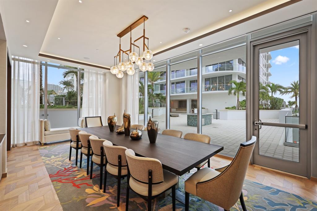 151 North Seabreeze Boulevard, Unit 903E Fort Lauderdale, FL 33304 - Photo 36 of 49 a view of a dining room with furniture window and wooden floor