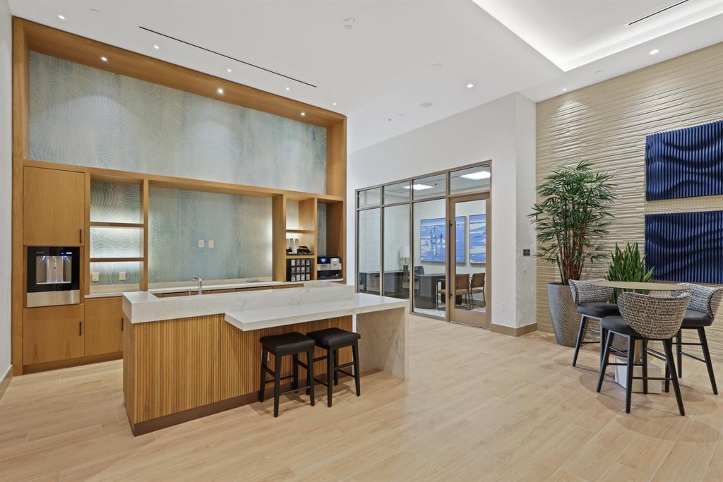 151 North Seabreeze Boulevard, Unit 903E Fort Lauderdale, FL 33304 - Photo 42 of 49 a large dining space with furniture window and wooden floor