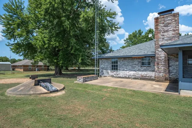a house view with a garden space