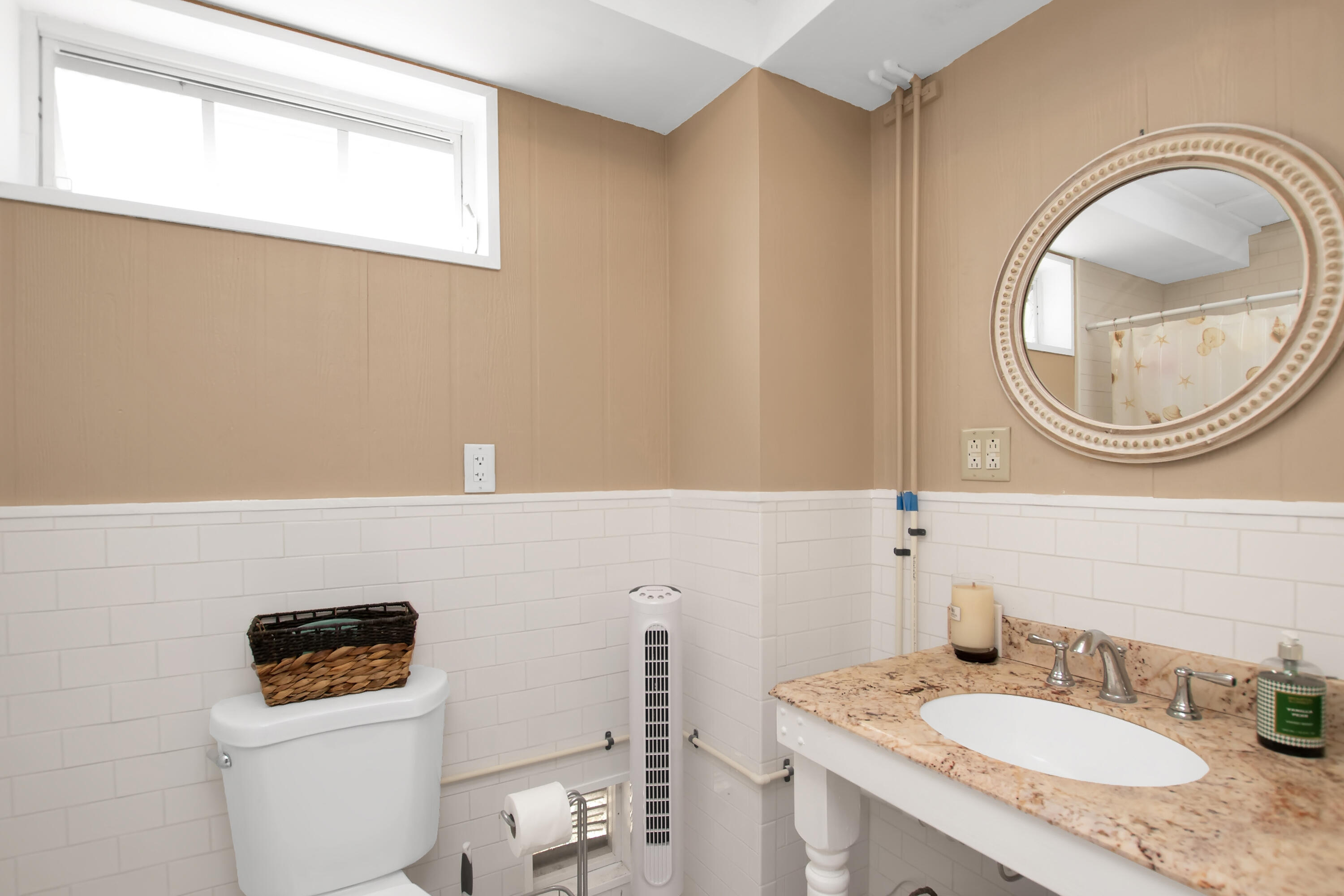 13 Flamingo Road Key Largo, FL 33037 - Photo 14 of 63 a bathroom with a sink a toilet and a mirror