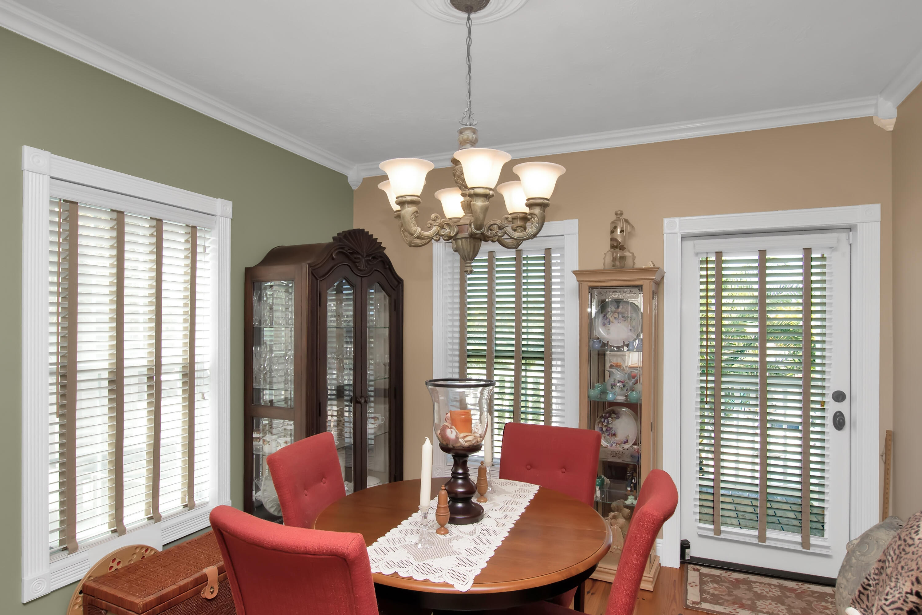 13 Flamingo Road Key Largo, FL 33037 - Photo 17 of 63 a dining room with furniture a chandelier and window