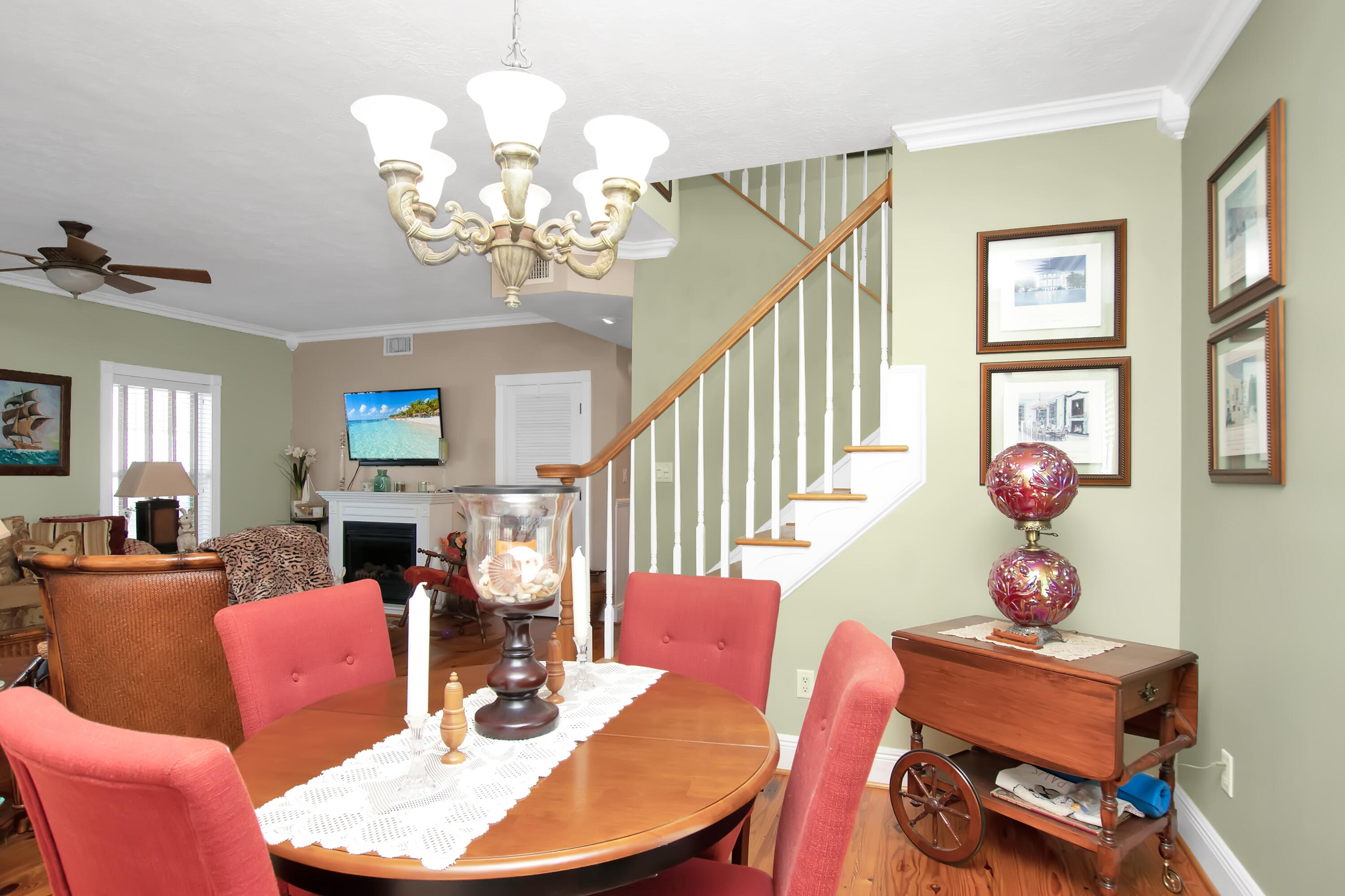 13 Flamingo Road Key Largo, FL 33037 - Photo 18 of 63 a living room with furniture a chandelier and a dining room