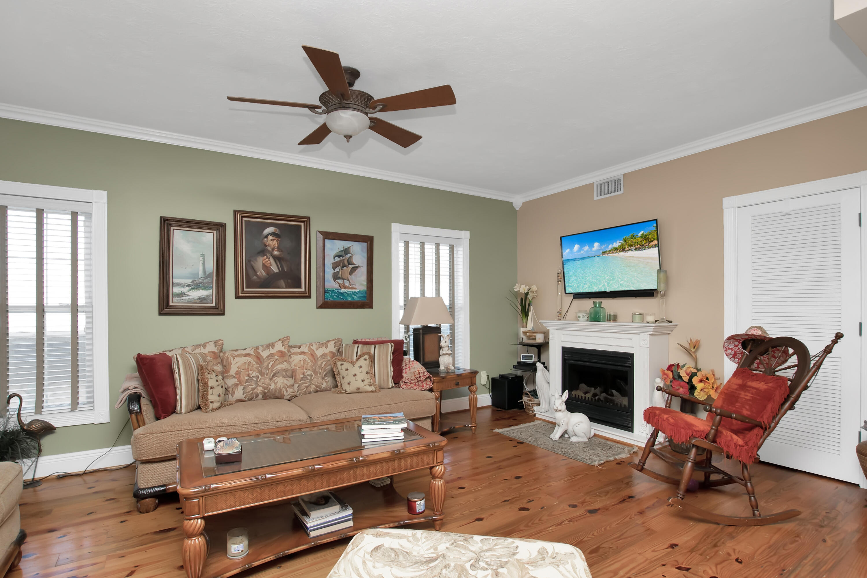 13 Flamingo Road Key Largo, FL 33037 - Photo 19 of 63 a living room with furniture and a fireplace