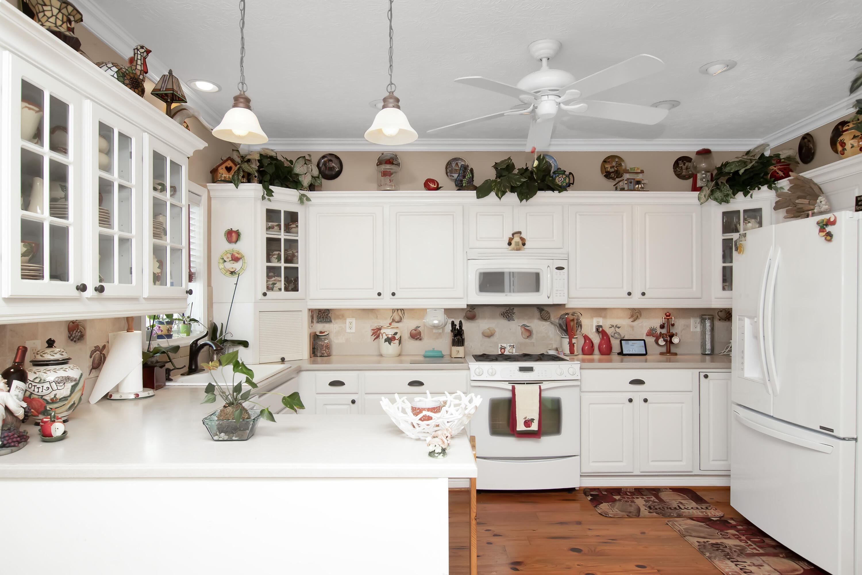 13 Flamingo Road Key Largo, FL 33037 - Photo 22 of 63 a kitchen with stainless steel appliances granite countertop a sink and cabinets