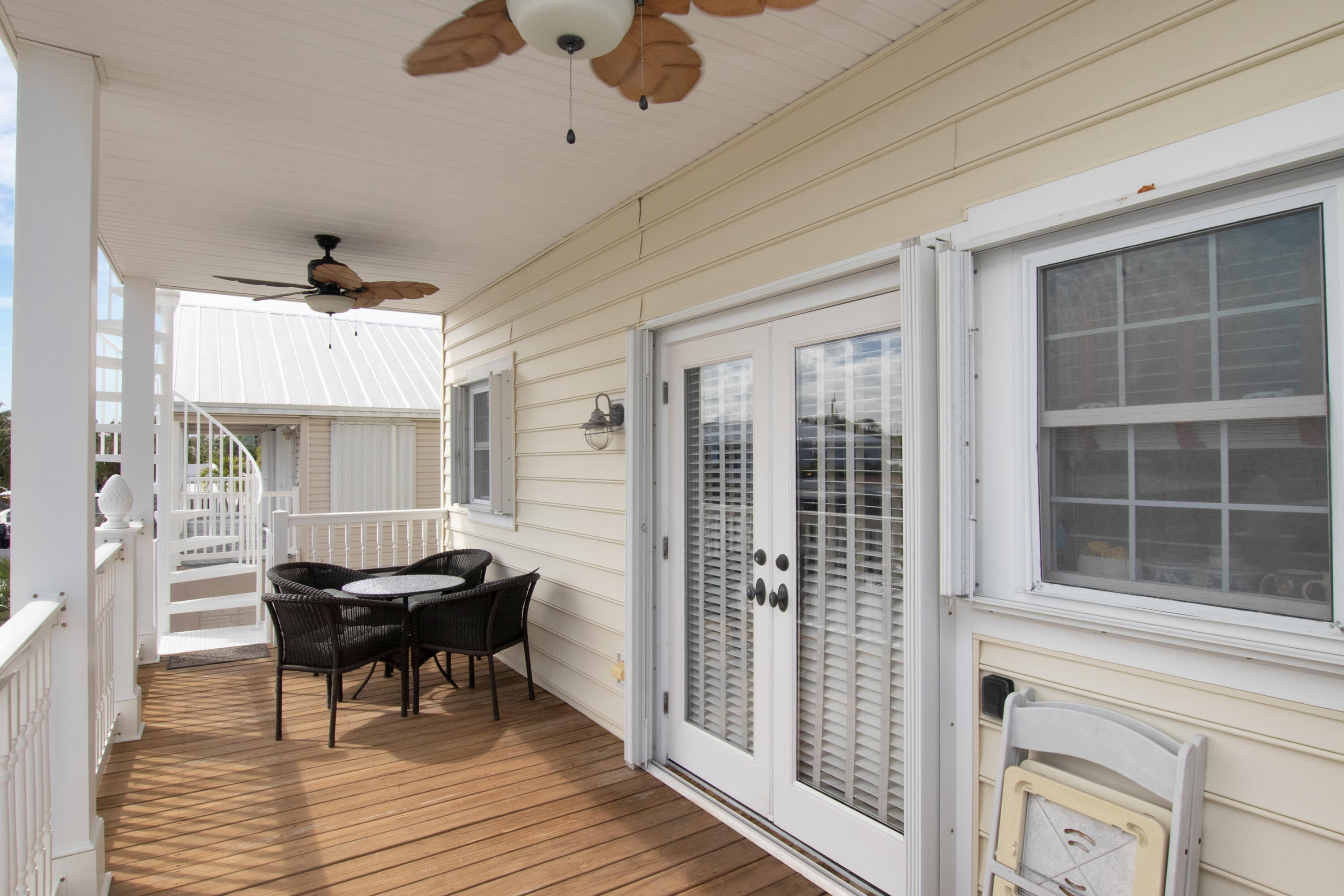 13 Flamingo Road Key Largo, FL 33037 - Photo 28 of 63 a living room with a wooden floor and a window