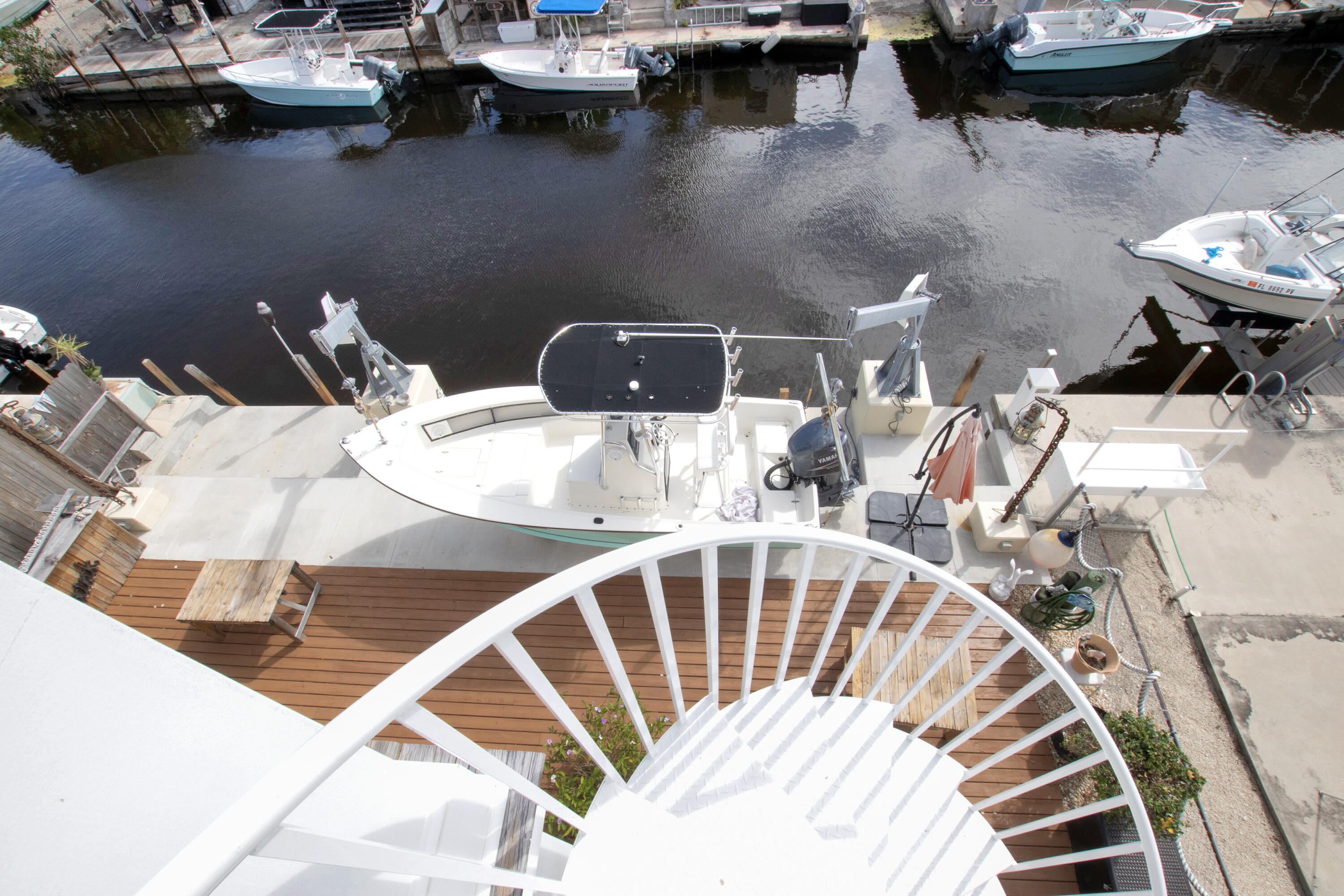 13 Flamingo Road Key Largo, FL 33037 - Photo 36 of 63 a view of a dining room with furniture and wooden floor