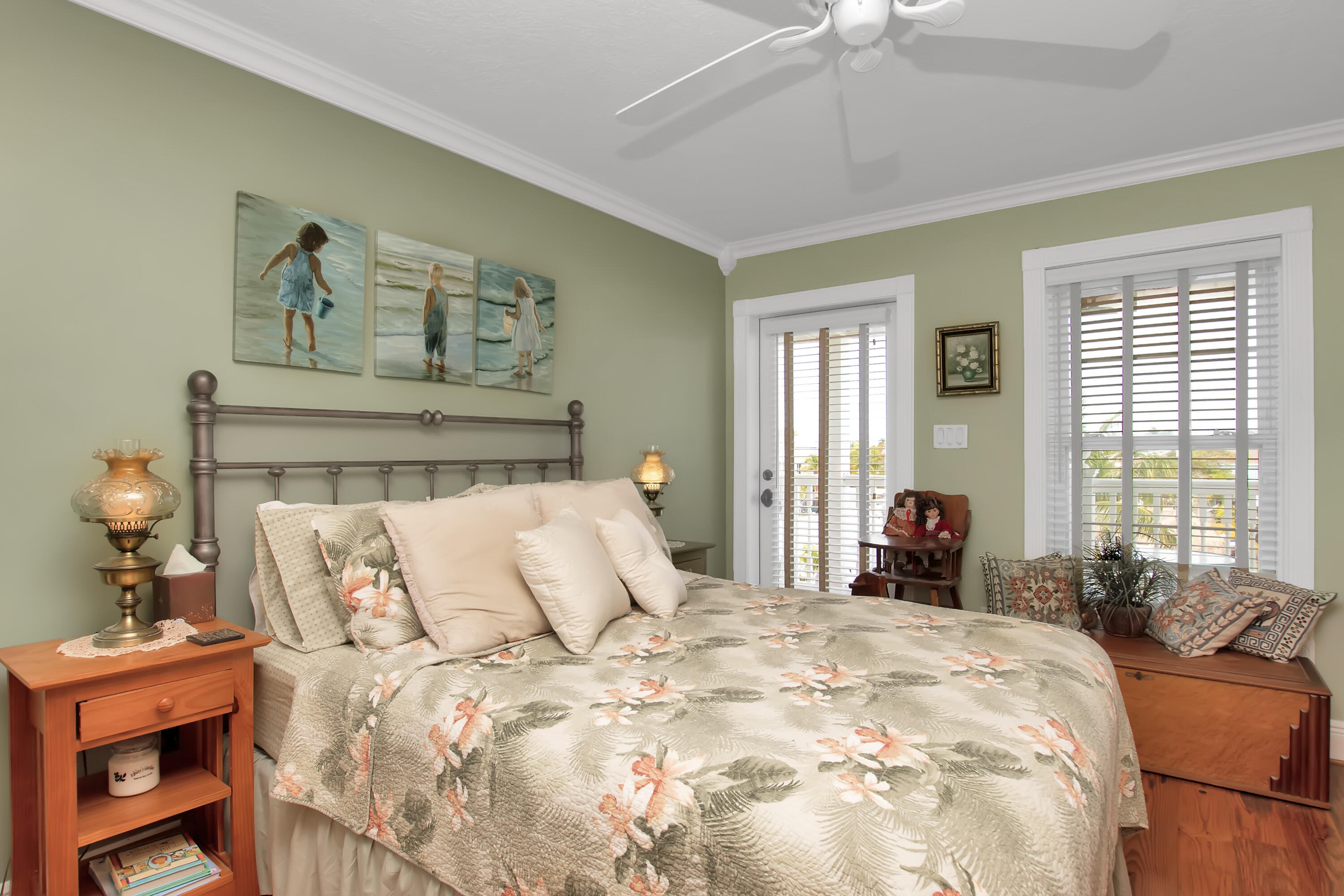 13 Flamingo Road Key Largo, FL 33037 - Photo 47 of 63 a large bed sitting in a bedroom next to a window