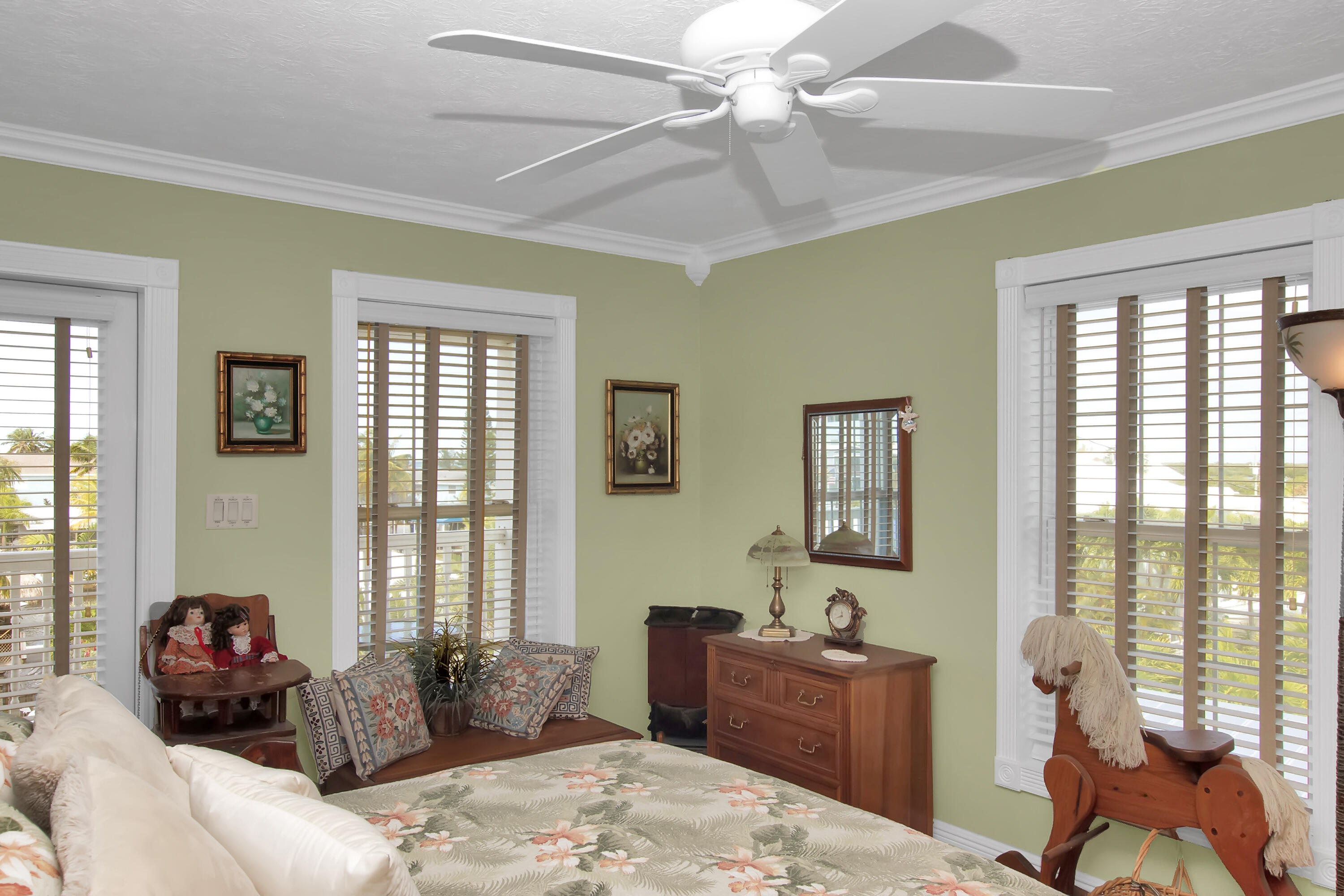 13 Flamingo Road Key Largo, FL 33037 - Photo 50 of 63 a bedroom with a bed and large windows