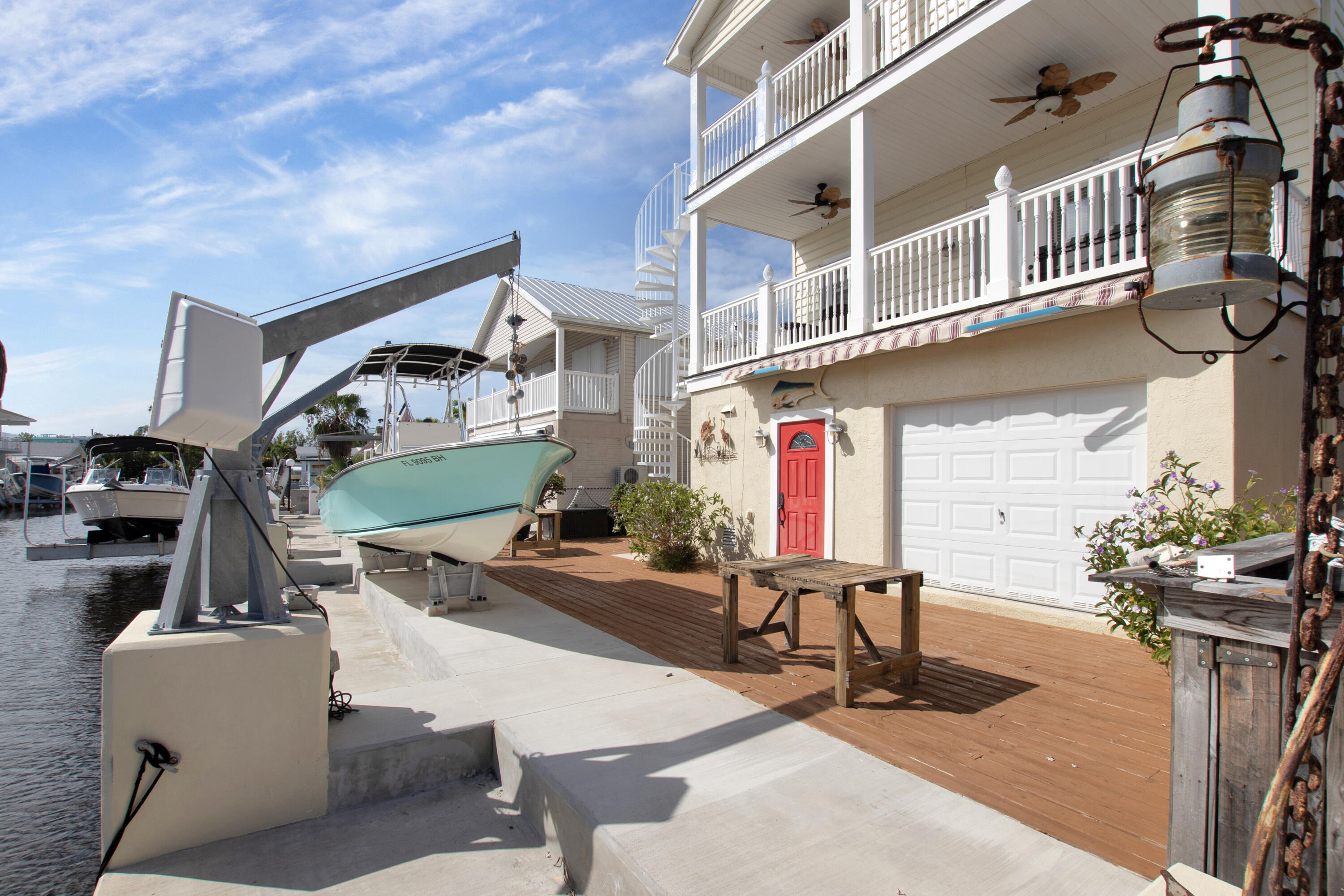 13 Flamingo Road Key Largo, FL 33037 - Photo 55 of 63 a view of a patio with table and chairs