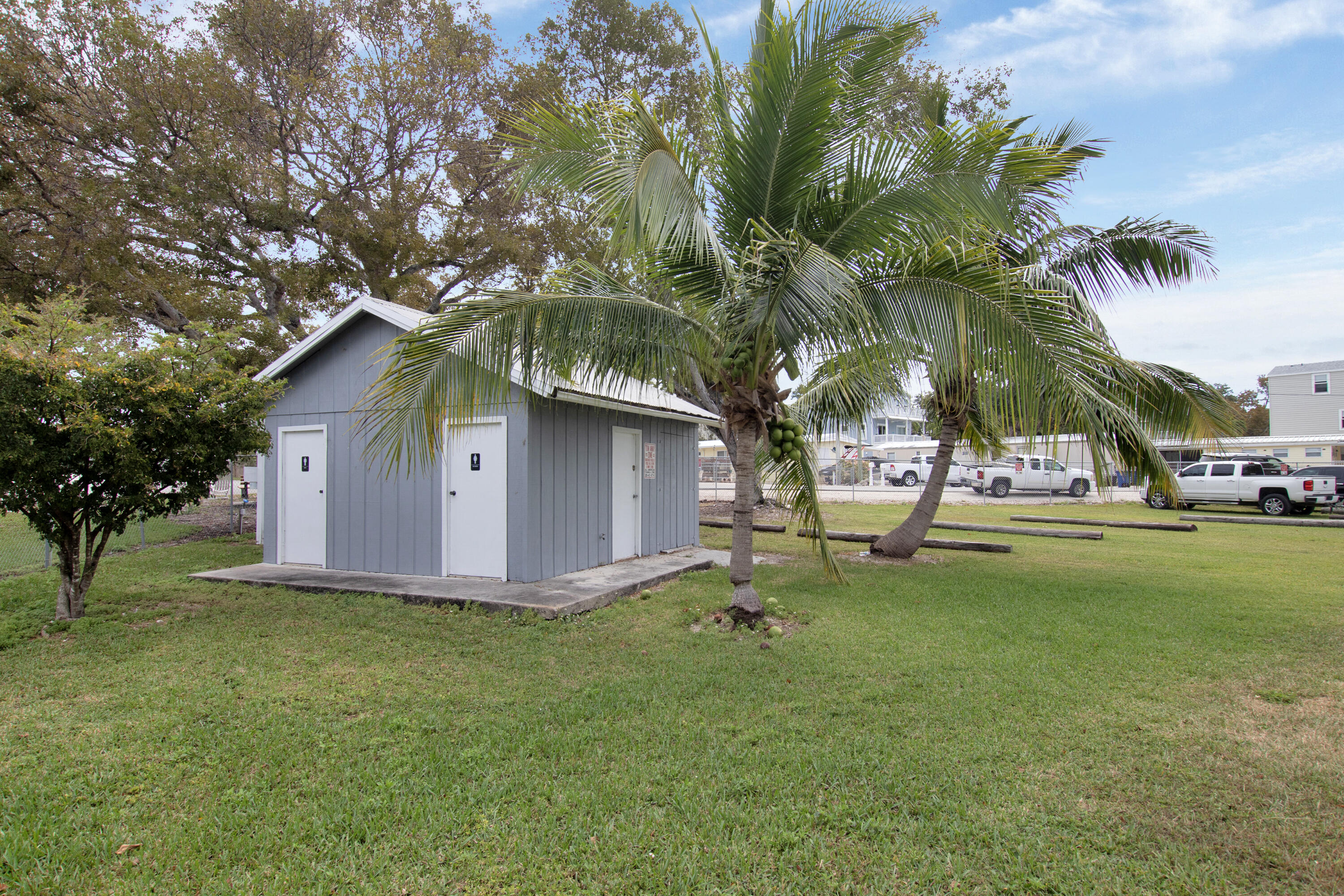 13 Flamingo Road Key Largo, FL 33037 - Photo 61 of 63 a view of backyard with swimming pool