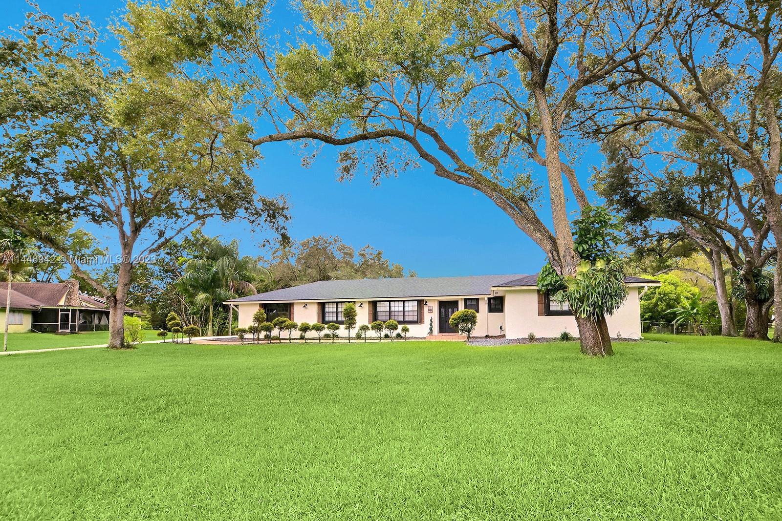 20510 Southwest 50th Place Southwest Ranches, FL 33332 - Photo 1 of 1 a view of house with a yard