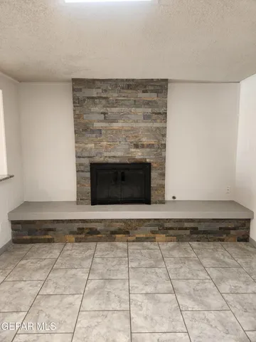 a living room with a fireplace