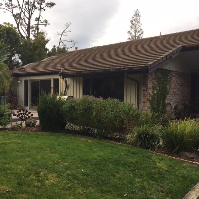 840 Chiltern Road Hillsborough, CA 94010 - Photo 2 of 7 a view of a house with garden