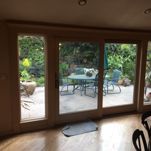 840 Chiltern Road Hillsborough, CA 94010 - Photo 6 of 7 a living room with furniture and a floor to ceiling window