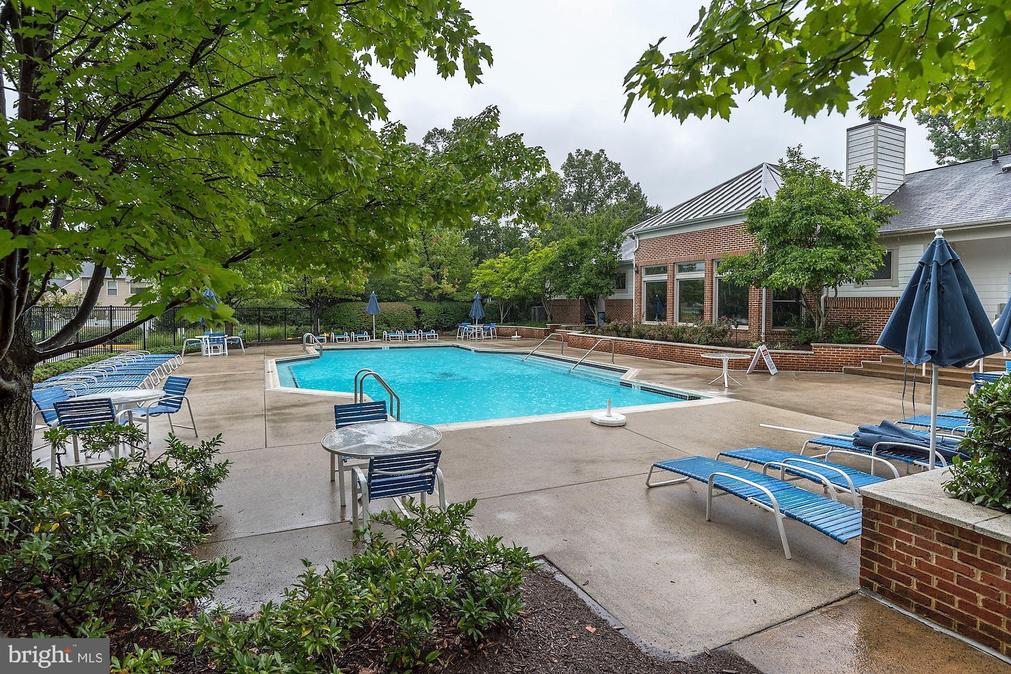 12062 Edgemere Circle Reston, VA 20190 - Photo 22 of 25 an outdoor space with swimming pool and furniture