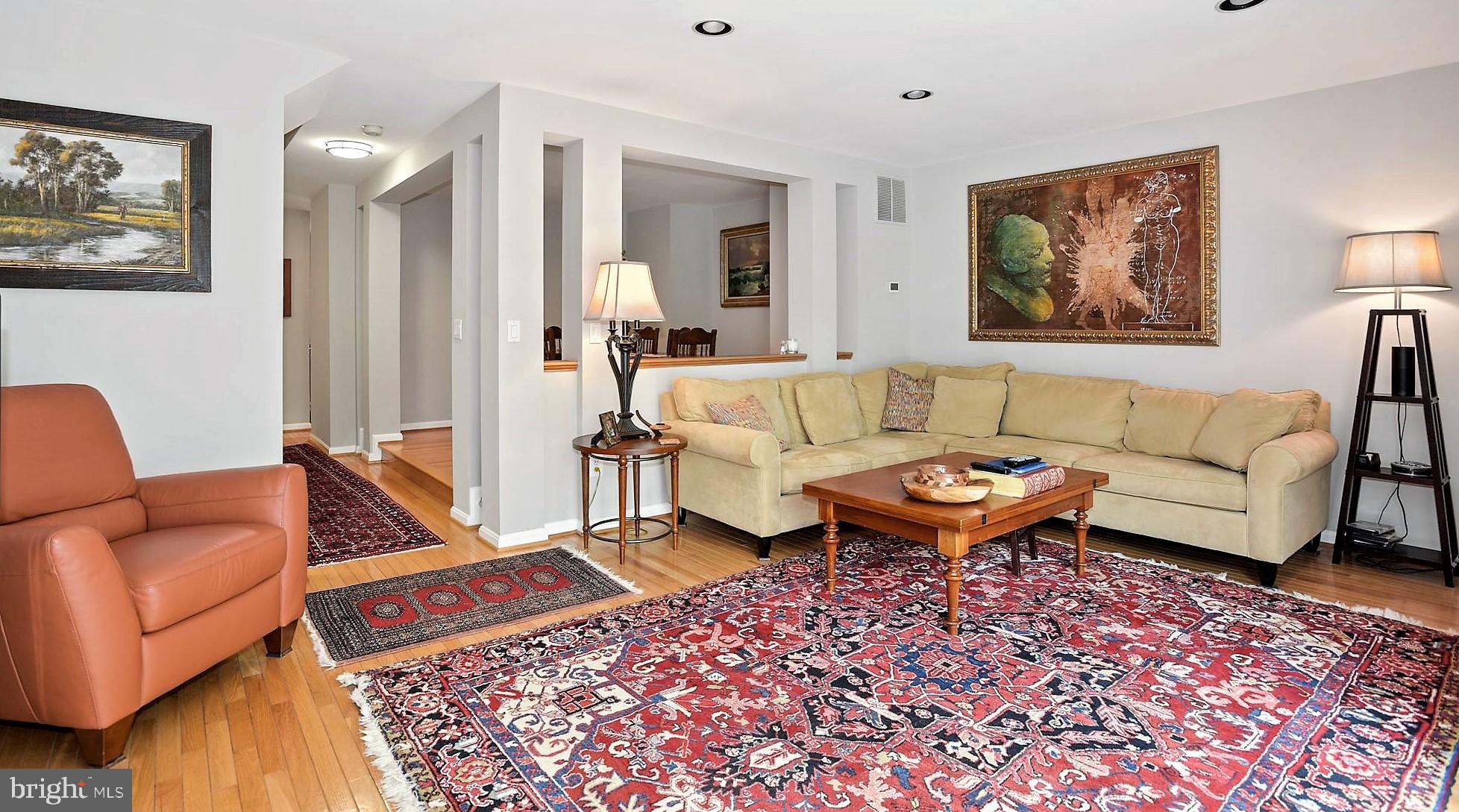 12062 Edgemere Circle Reston, VA 20190 - Photo 9 of 25 a living room with furniture and a rug