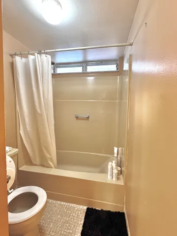 a bathroom with a sink and a bathtub