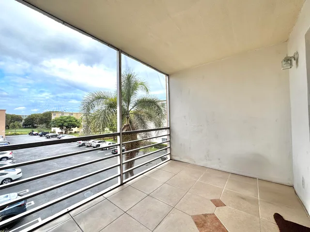 a view of a balcony with an outdoor space