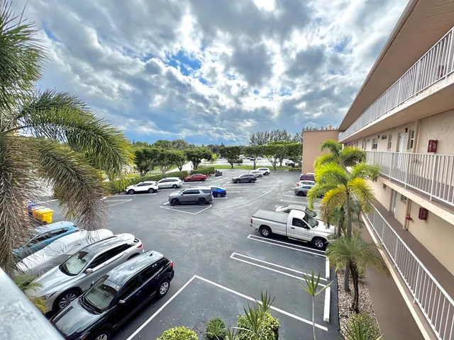a view of a street with cars