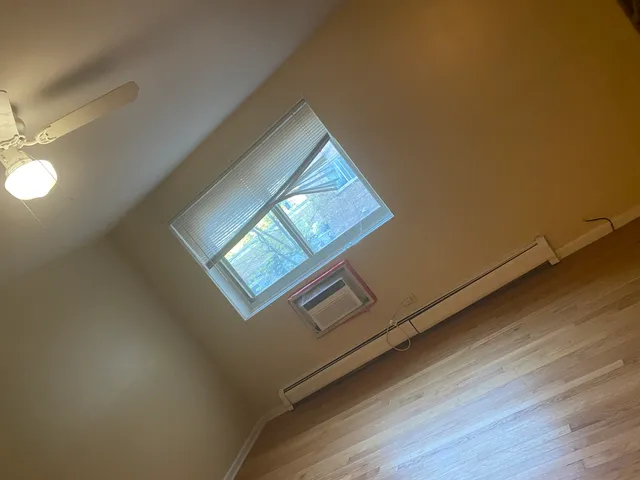 a white toilet sitting next to a sink