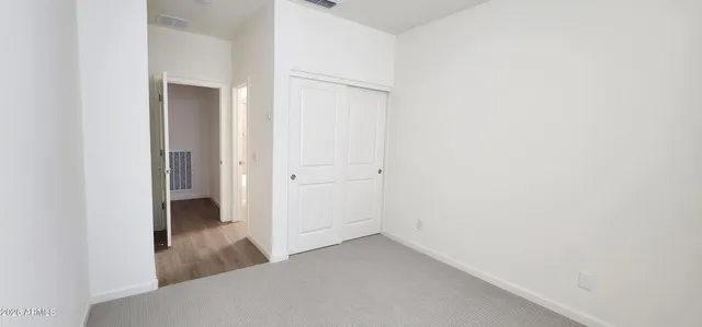 a bathroom with a double vanity sink and mirror