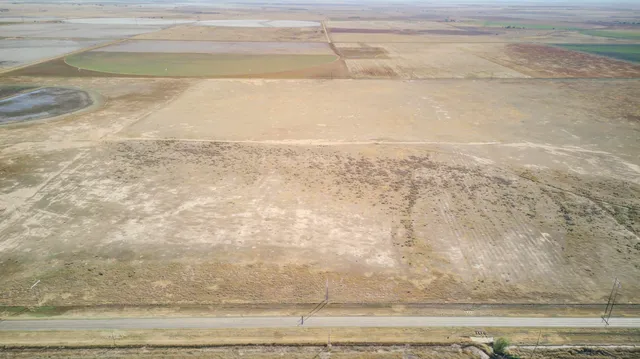 a view of wooden floor in a bathroom