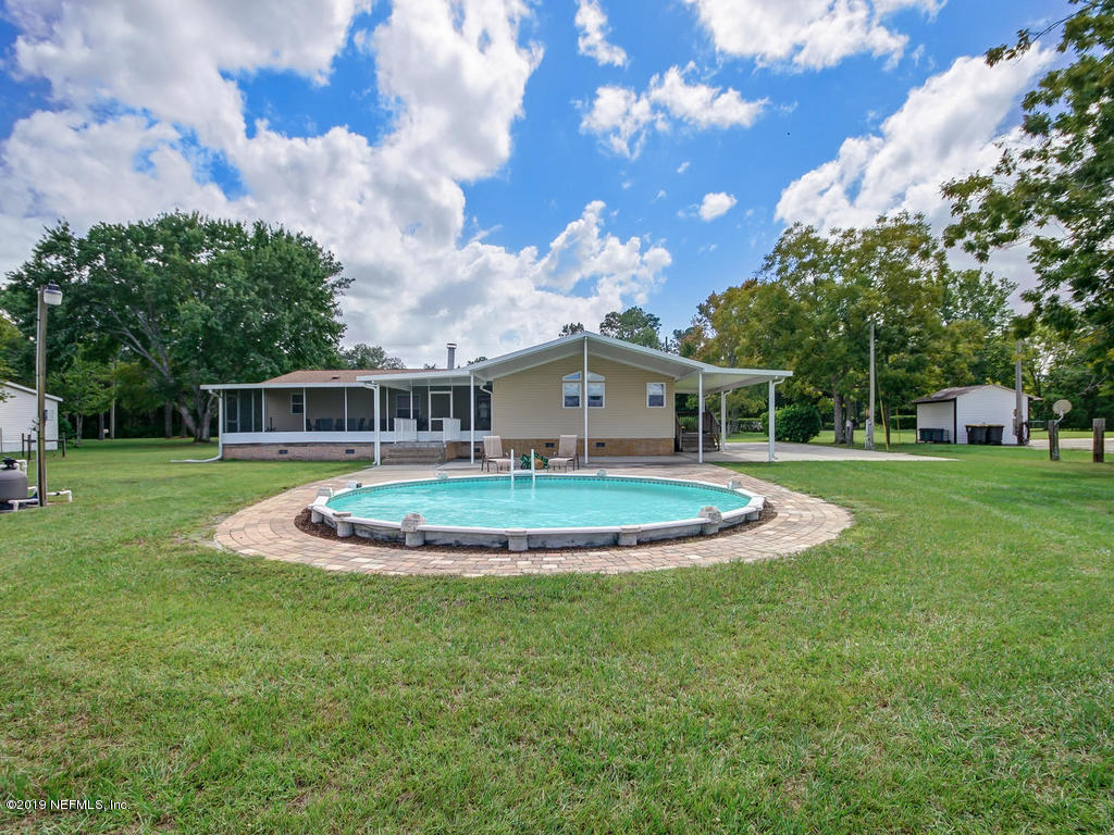 9567 Taylor Field Road Jacksonville, FL 32222 - Photo 40 of 59 9567 Taylor Field Rd-059-025-Back of Hom