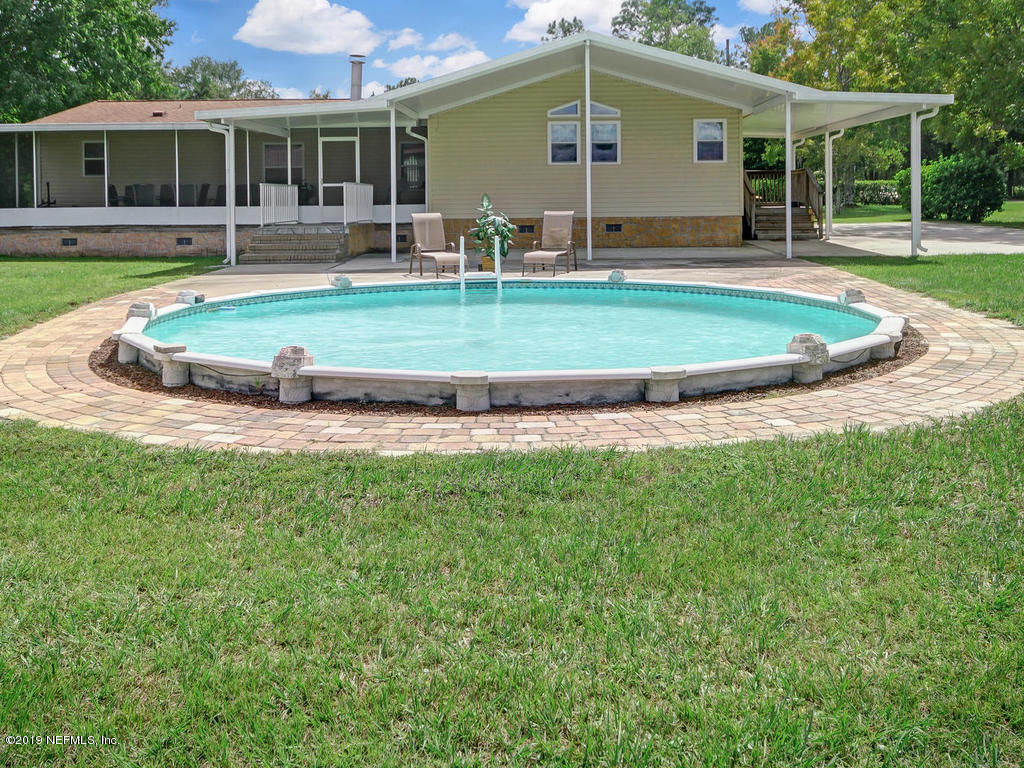 9567 Taylor Field Road Jacksonville, FL 32222 - Photo 41 of 59 9567 Taylor Field Rd-060-037-Back of Hom