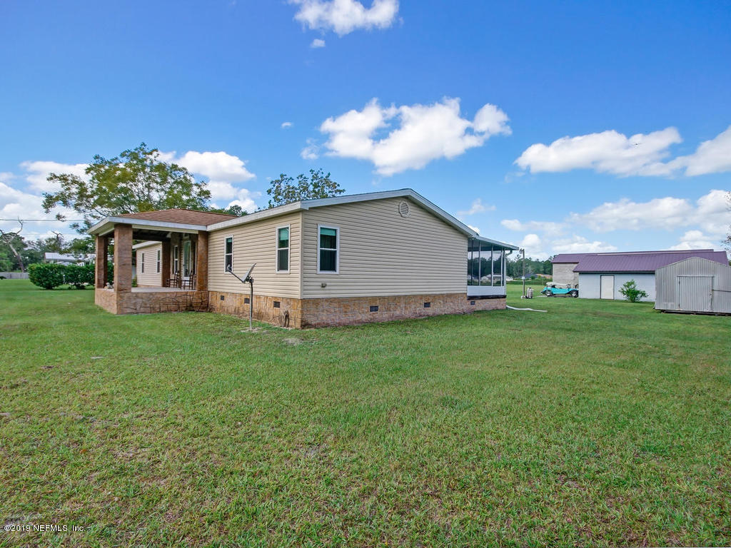 9567 Taylor Field Road Jacksonville, FL 32222 - Photo 5 of 59 9567 Taylor Field Rd-007-009-Side Yard-M