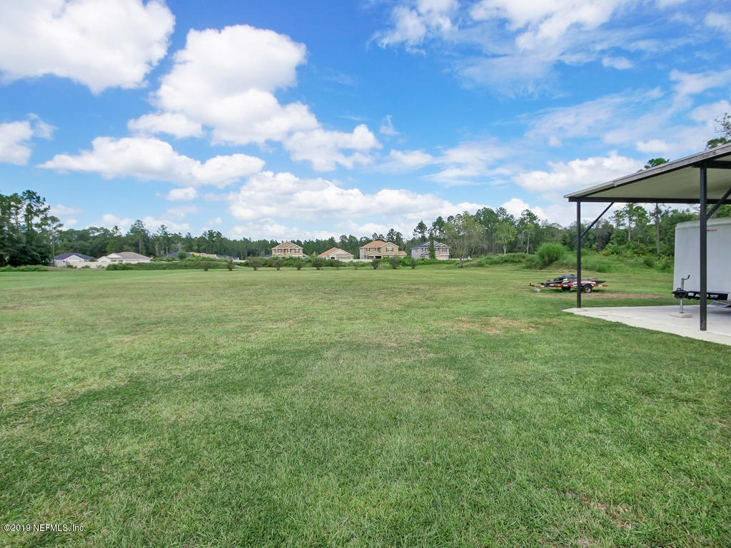9567 Taylor Field Road Jacksonville, FL 32222 - Photo 57 of 59 9567 Taylor Field Rd-092-010-Back Yard-M