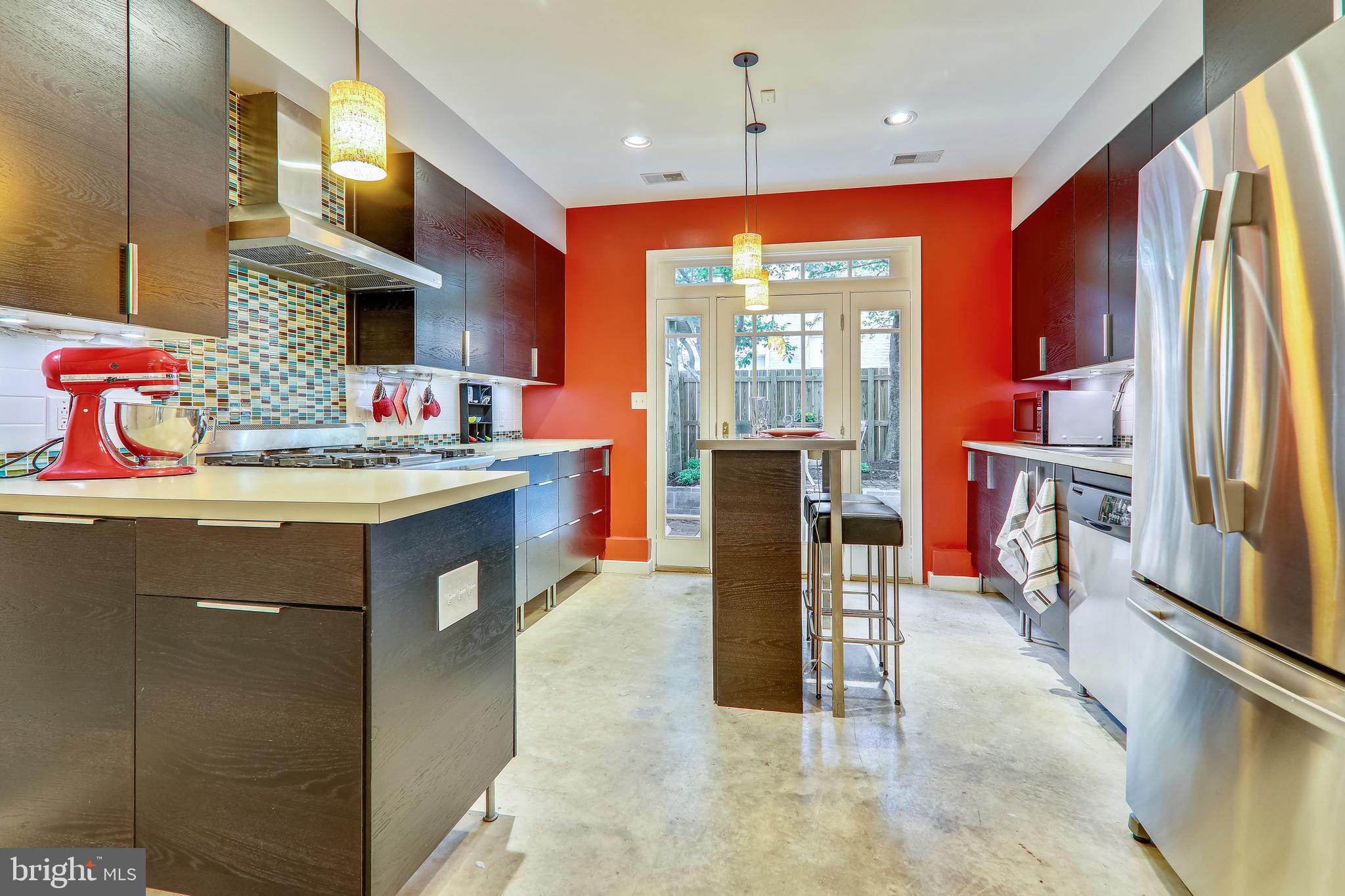 438 Ridge Street Northwest Washington, DC 20001 - Photo 11 of 18 Lots of workspace and a great breakfast bar island