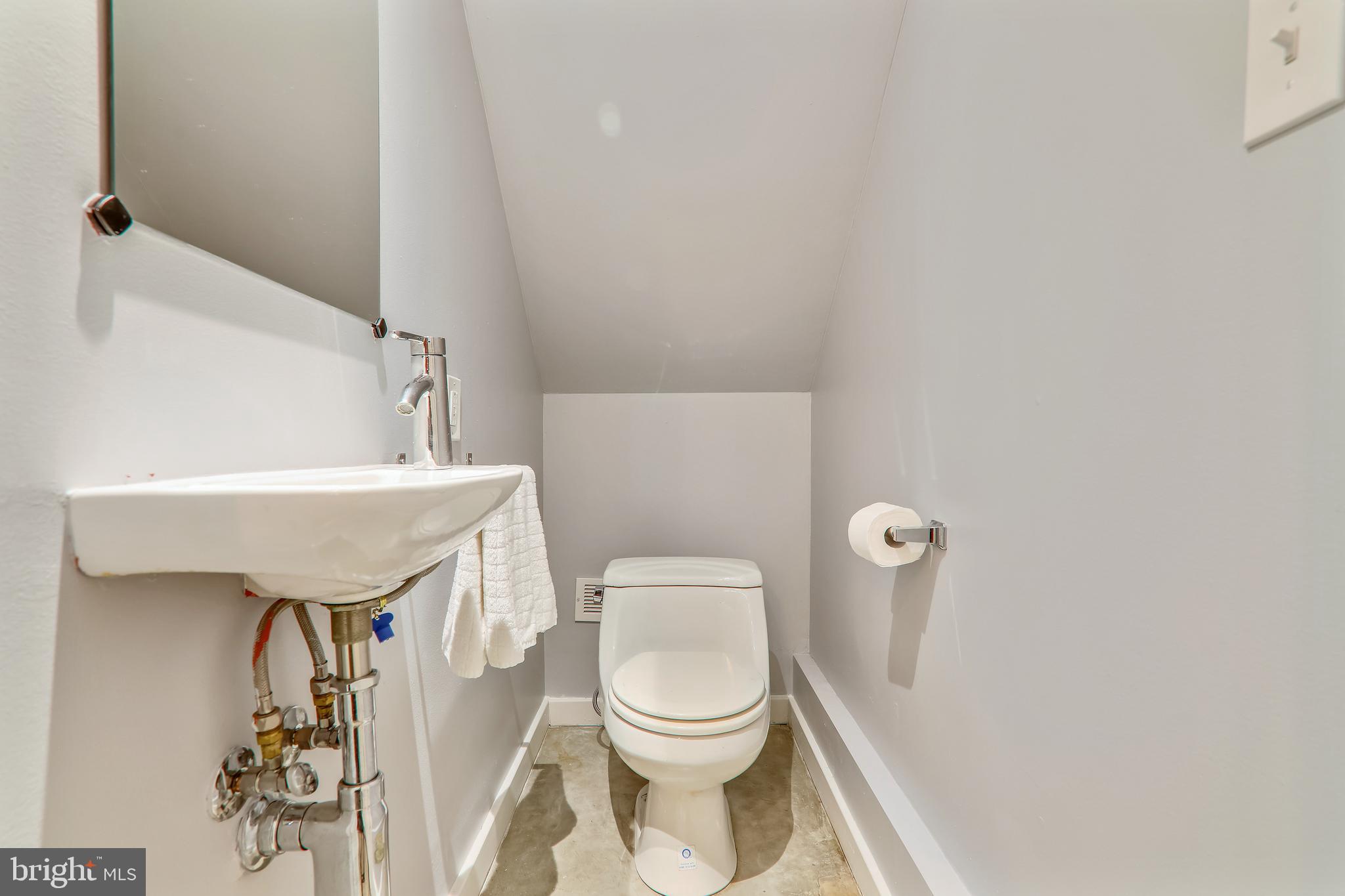 438 Ridge Street Northwest Washington, DC 20001 - Photo 18 of 18 Efficient use of space = created under the stairs