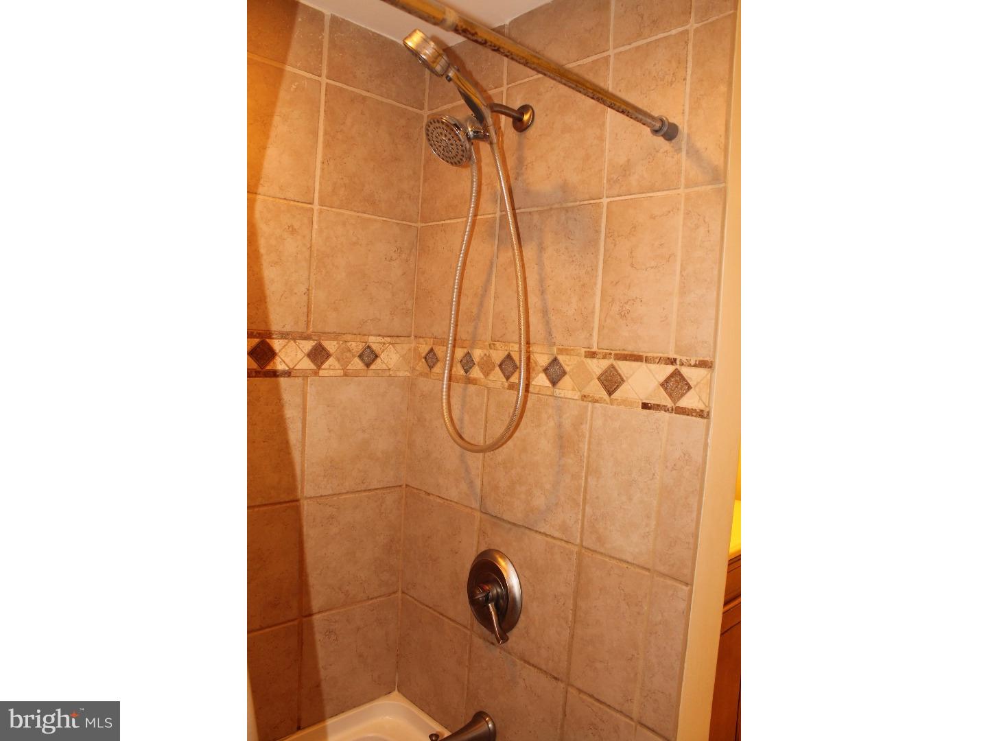 44 Hillside Road Stratford, NJ 08084 - Photo 22 of 25 a bathroom with a shower