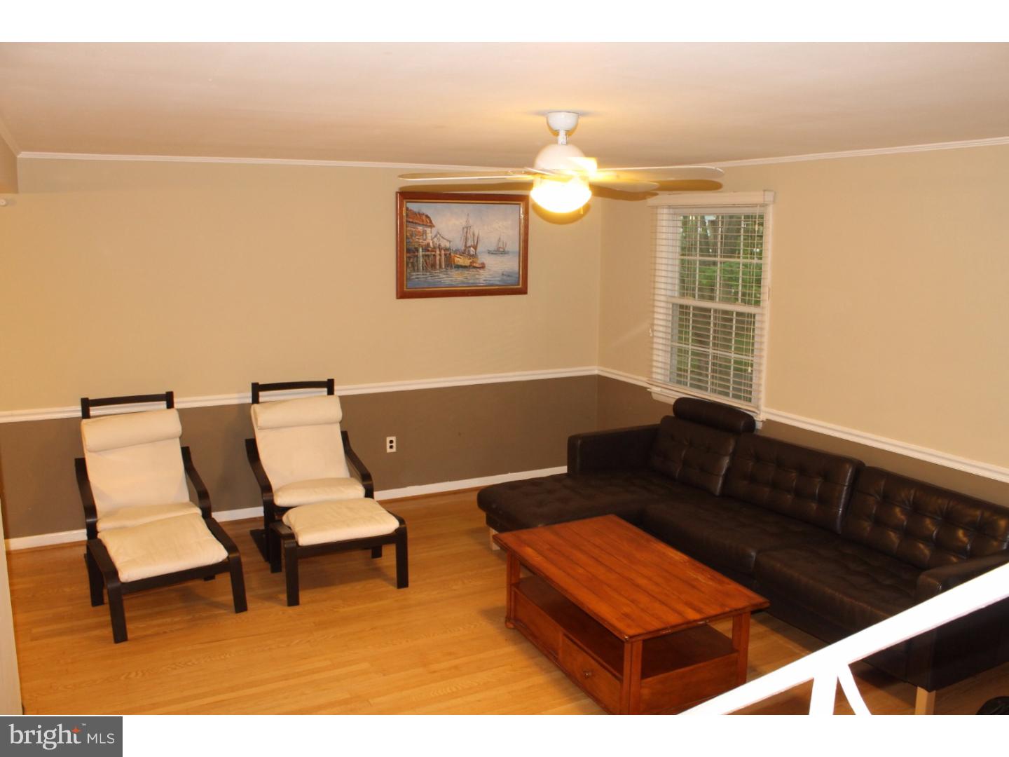 44 Hillside Road Stratford, NJ 08084 - Photo 6 of 25 a living room with furniture and a window