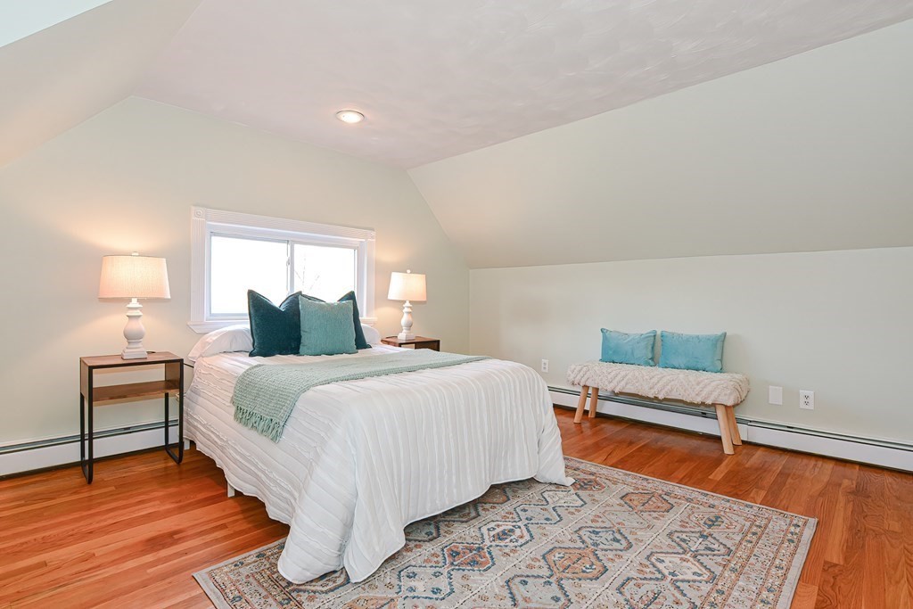 64 Hyde Park Avenue, Unit 3 Boston, MA 02130 - Photo 13 of 27 a bedroom with bed and window