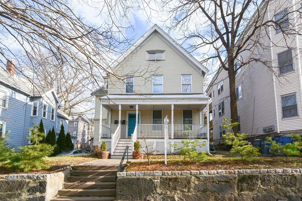 64 Hyde Park Avenue, Unit 3 Boston, MA 02130 - Photo 22 of 27 a front view of a house with garden