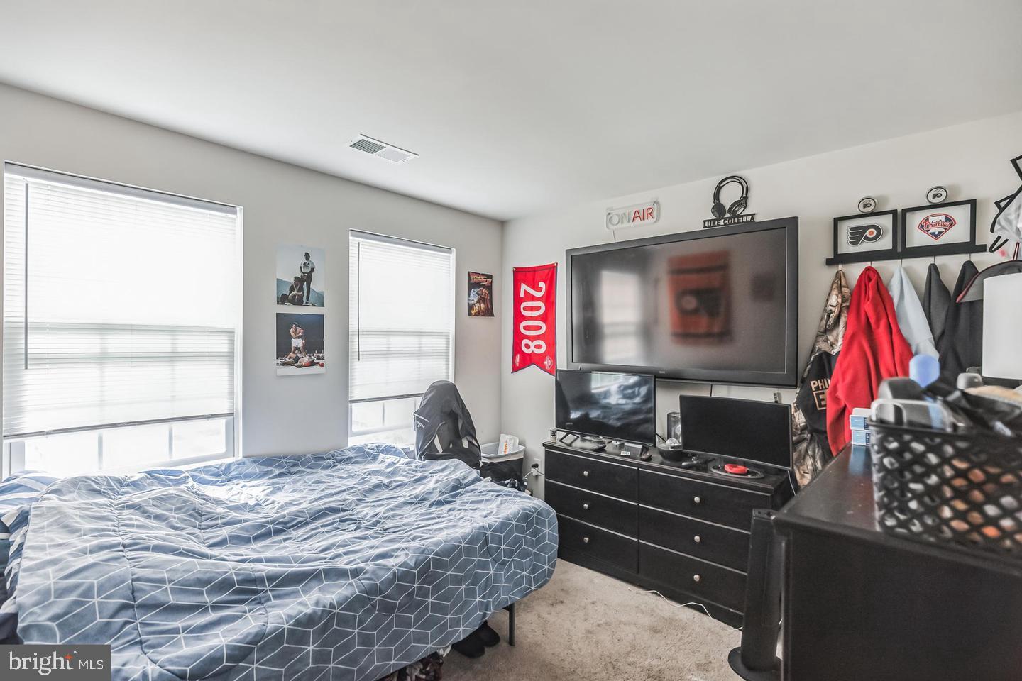 28 Sparrow Circle Sewell, NJ 08080 - Photo 12 of 15 a bedroom with a bed and dresser with wooden floor