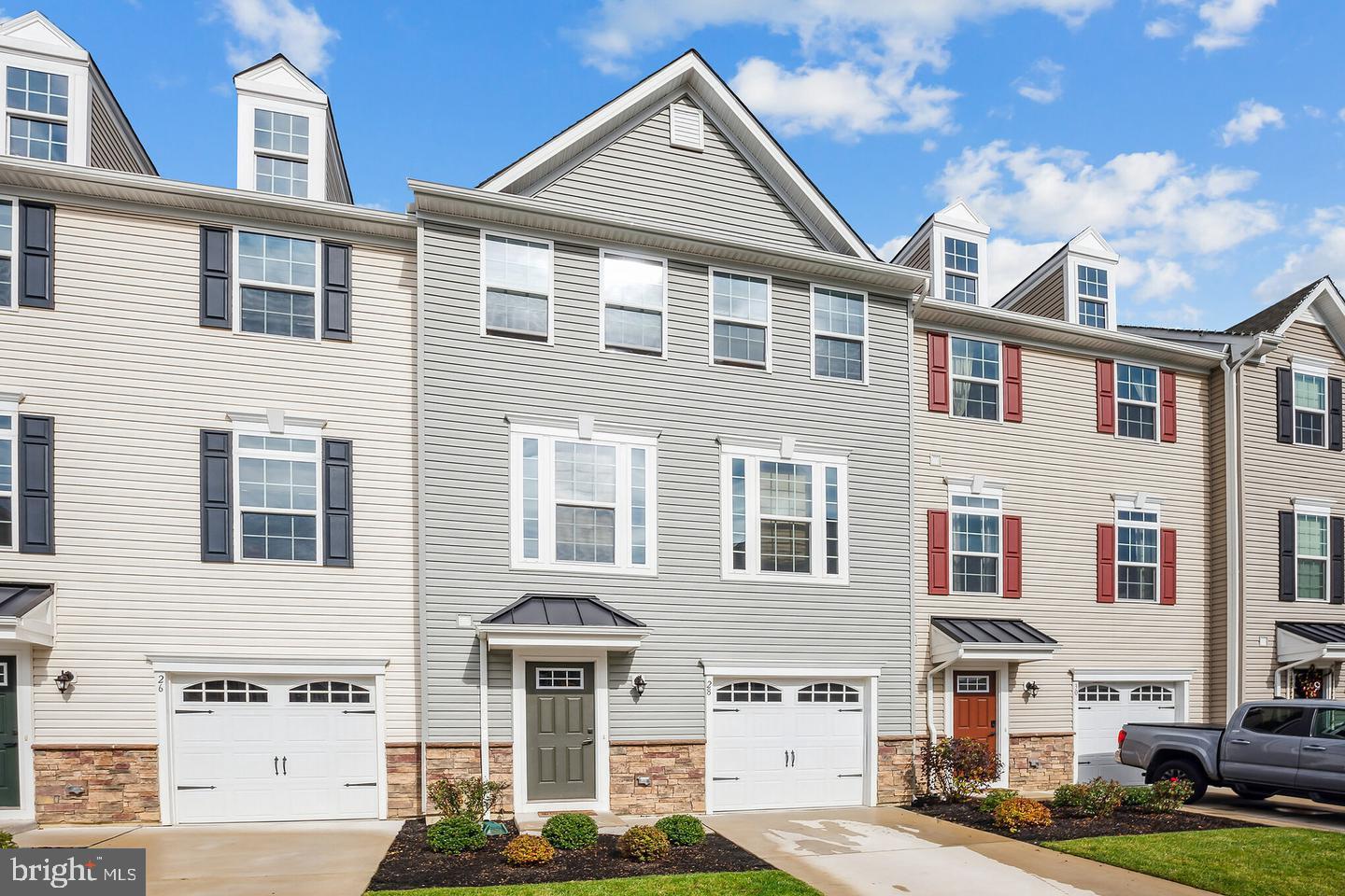 28 Sparrow Circle Sewell, NJ 08080 - Photo 2 of 15 a view of a white building among the street