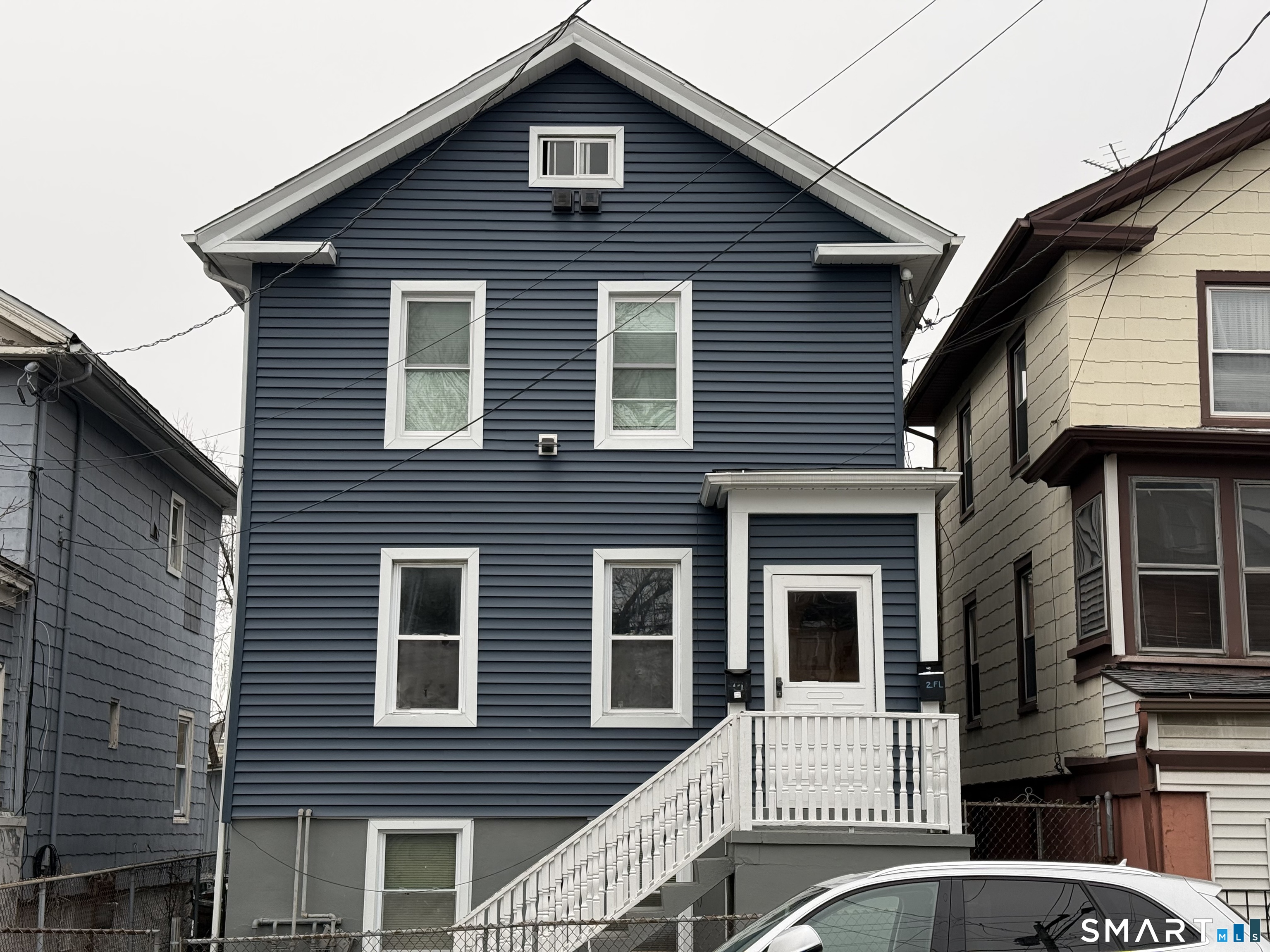 222 Pequonnock Street, Unit 2 Bridgeport, CT 06604 - Photo 10 of 10 a view of a house with a large windows
