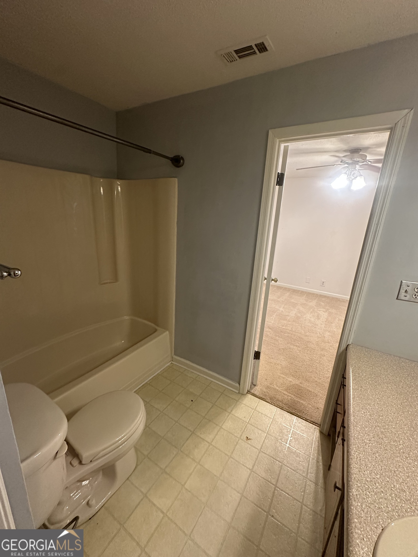 7500 Bevis Road Franklin, GA 30217 - Photo 22 of 31 a bathroom with a toilet and shower