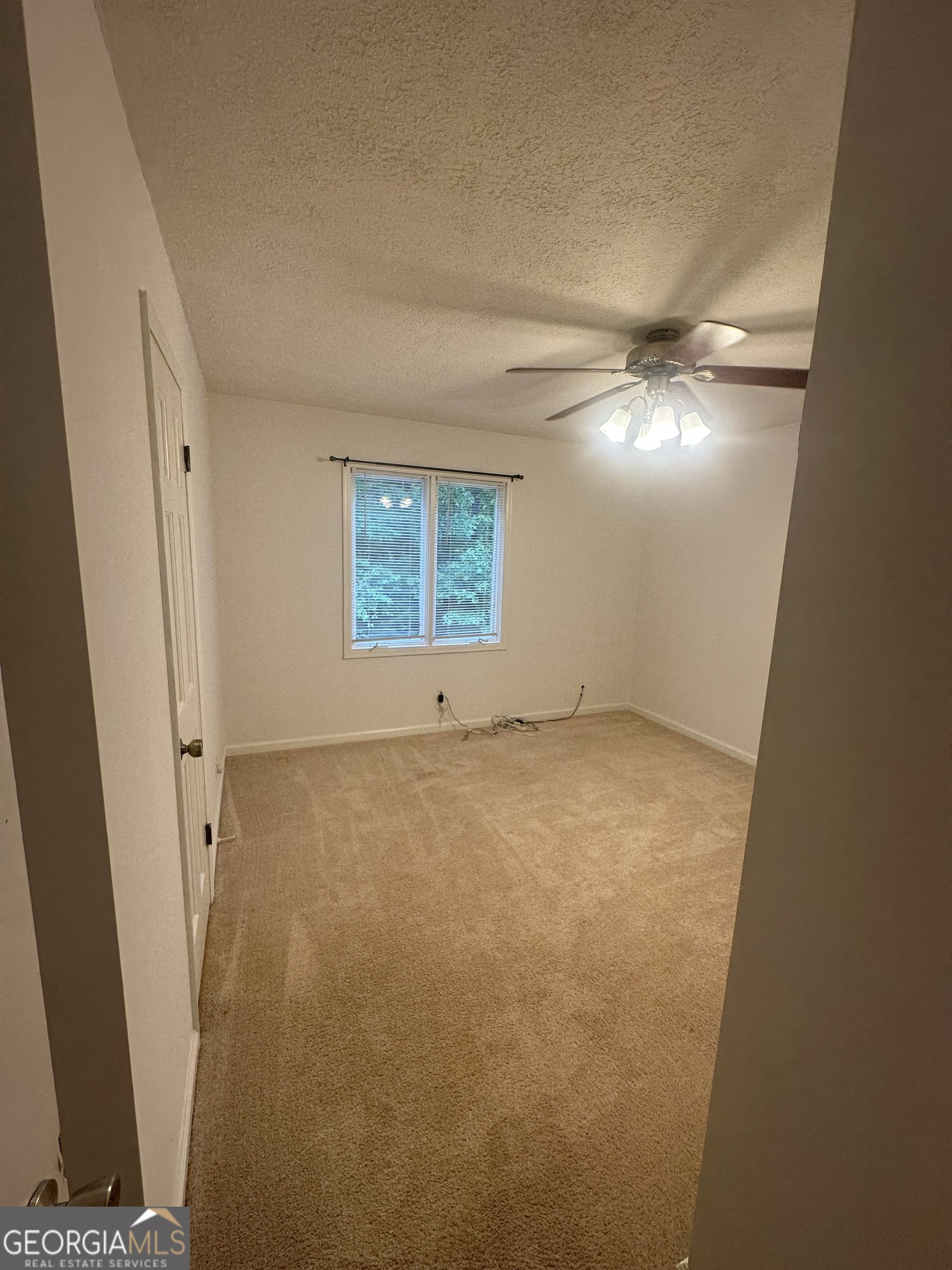 7500 Bevis Road Franklin, GA 30217 - Photo 23 of 31 an empty room with windows and entrance