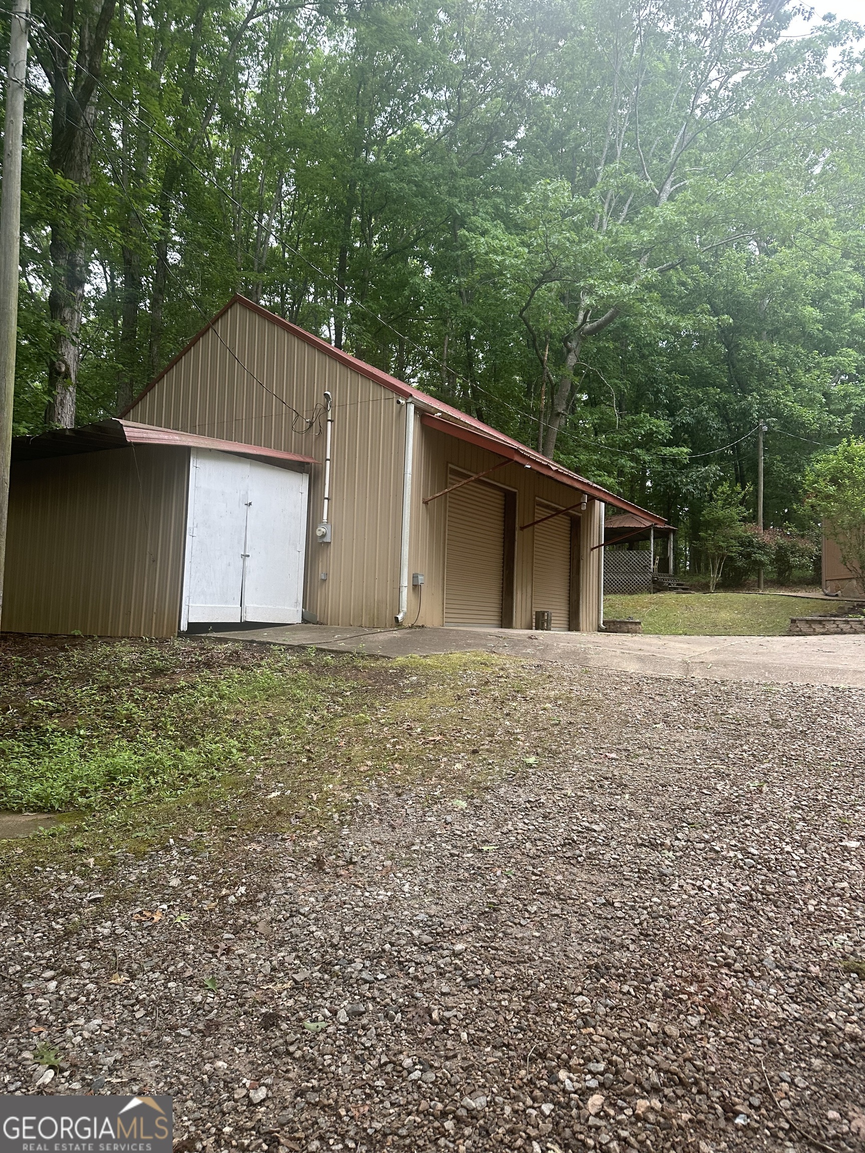 7500 Bevis Road Franklin, GA 30217 - Photo 26 of 31 a front view of house with yard and trees