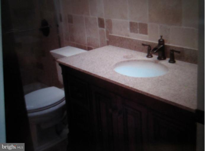 0 Green Ridge Road Northeast Flintstone, MD 21530 - Photo 9 of 19 Bath with travertine tiles and granite top vanity