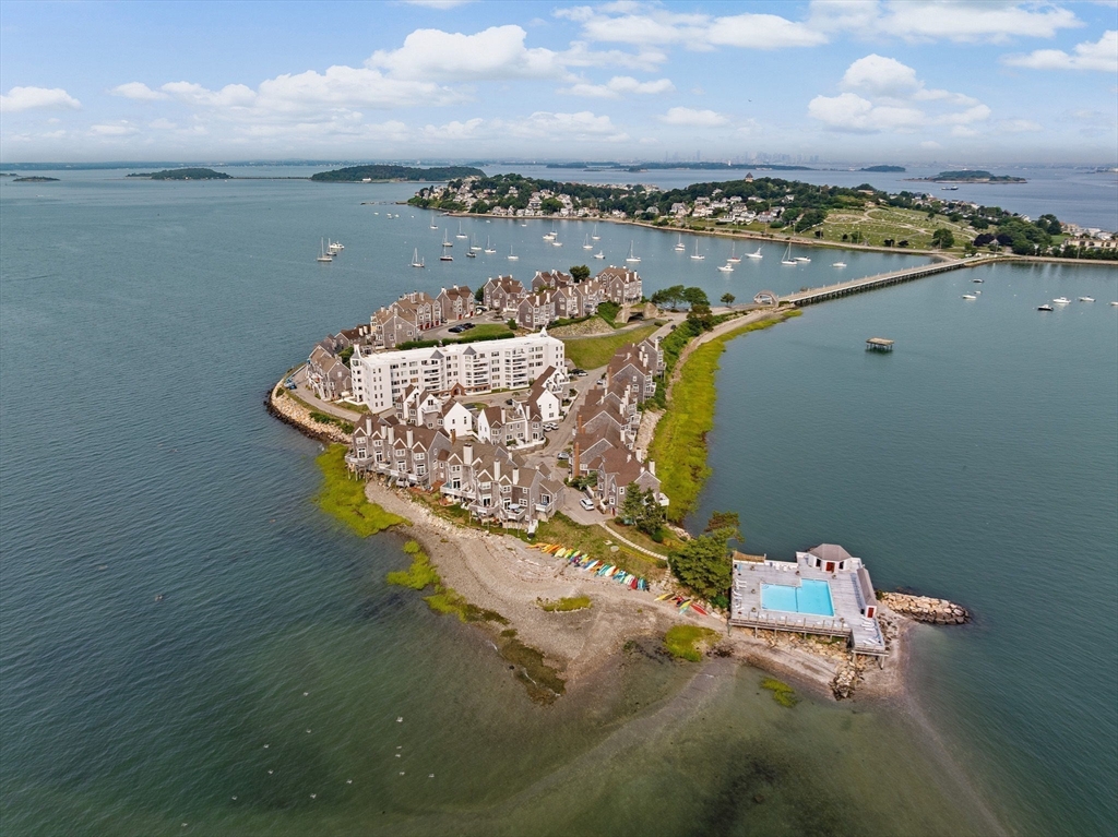 1 Commodore Court, Unit 305 Hull, MA 02045 - Photo 25 of 27 a view of a lake in middle of the house